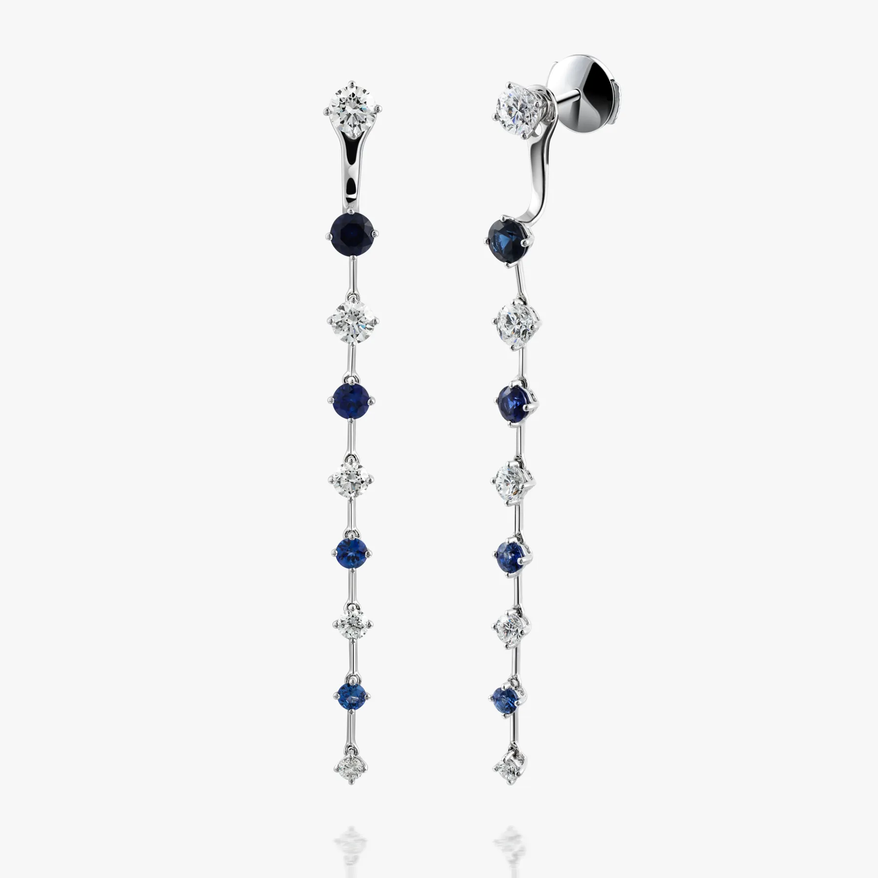 Long drop earrings set with white and blue stones